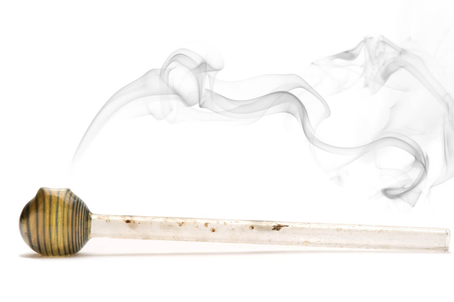 A pipe with smoke coming out of it, depicting addiction and the need for drug detox.