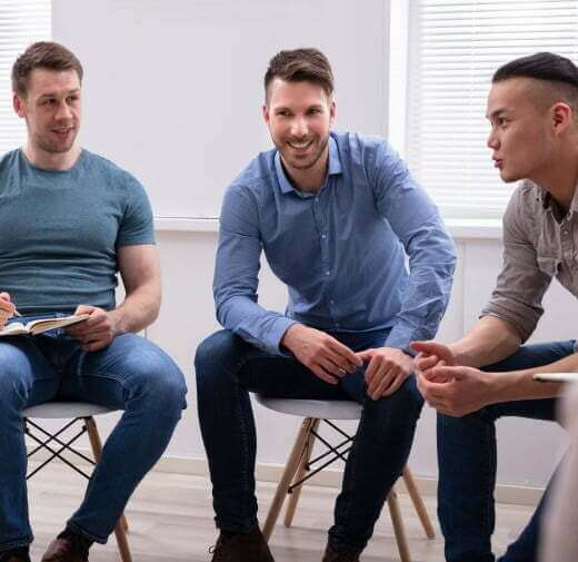 Men enjoy group therapy at Prosperity Haven after verifying Aetna rehab coverage